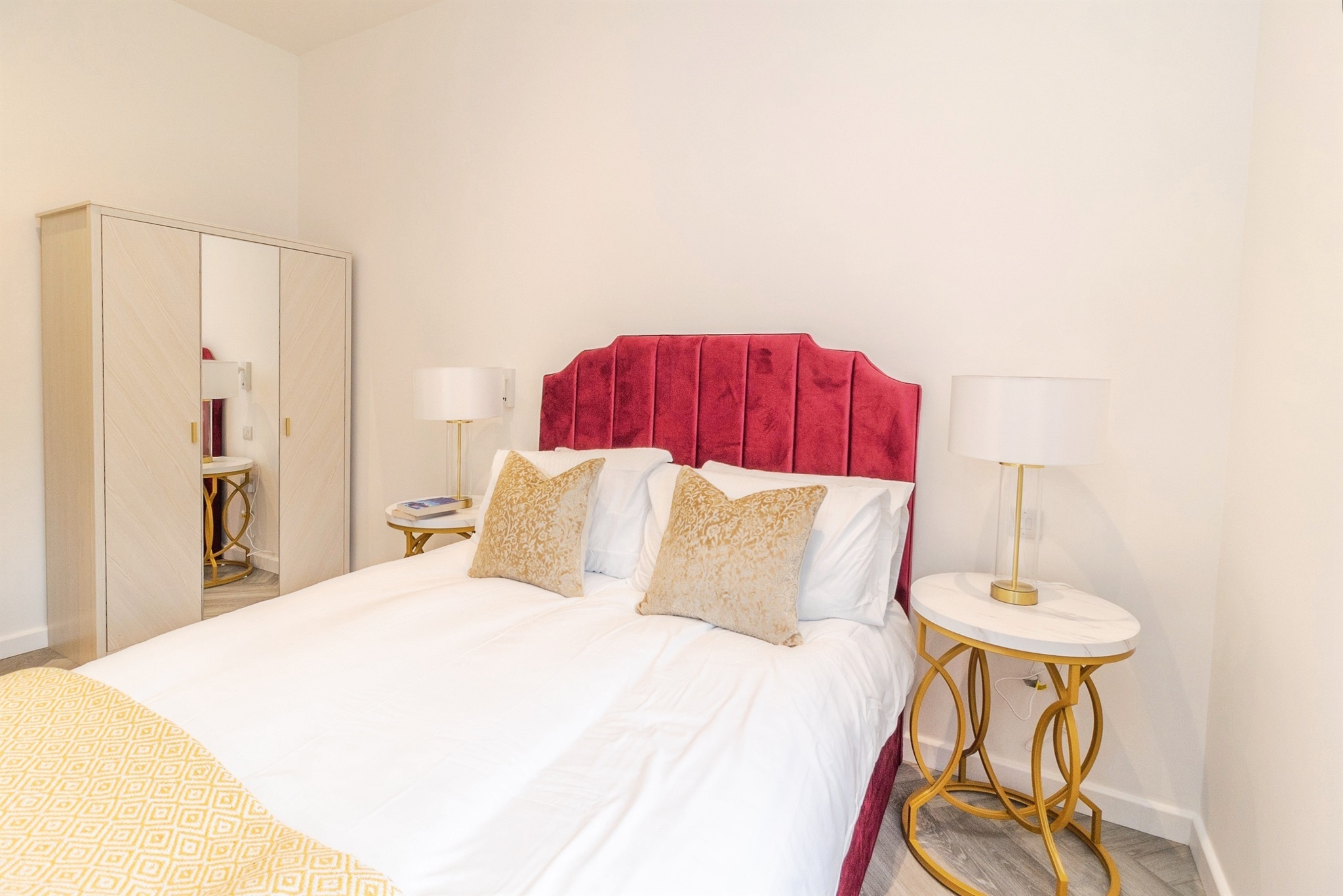 Luxury bedroom at Caldecotte Lake apartments in Milton Keynes with spacious layout, contemporary design, natural light, and premium finishes.