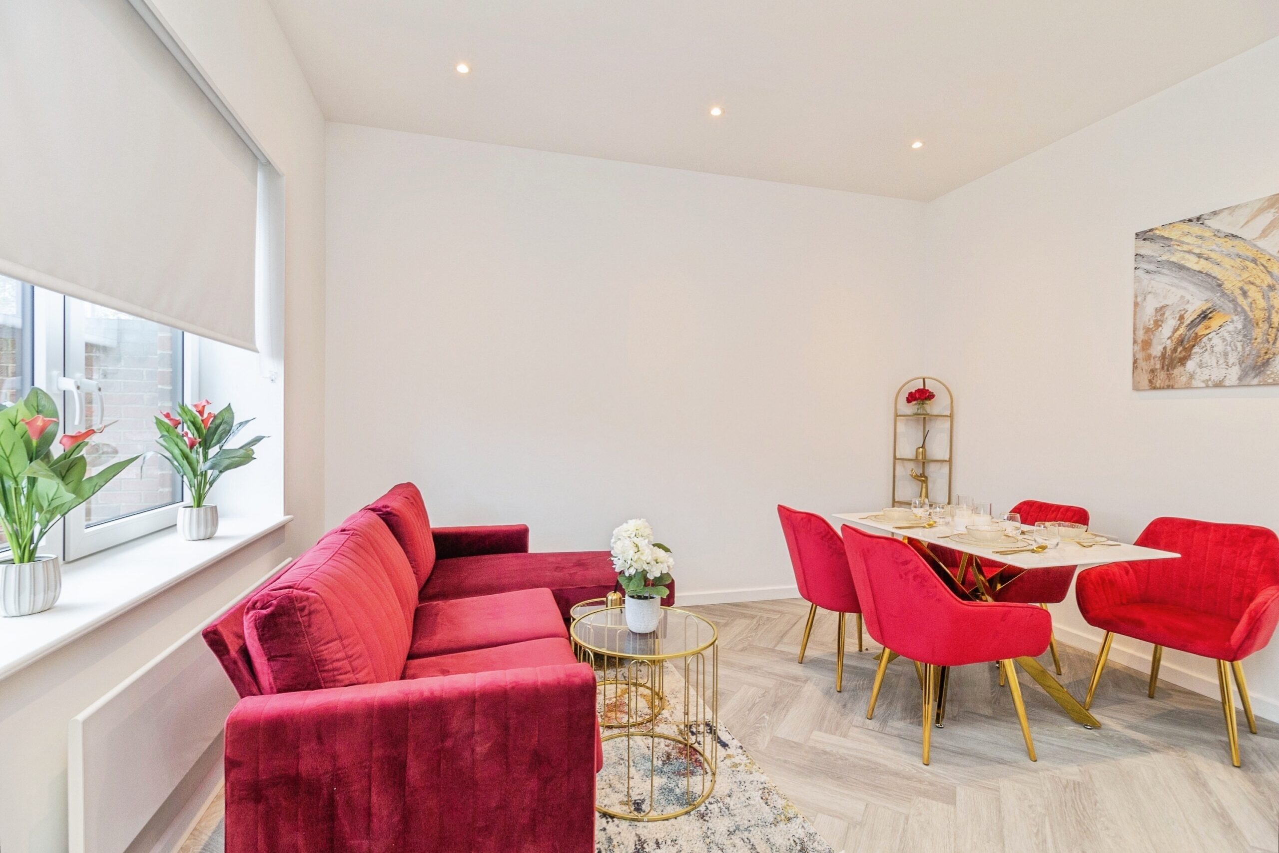 Luxury open-plan dining and living room at Caldecotte Lake apartments in Milton Keynes with modern interiors, premium finishes, natural light, and spacious layout.