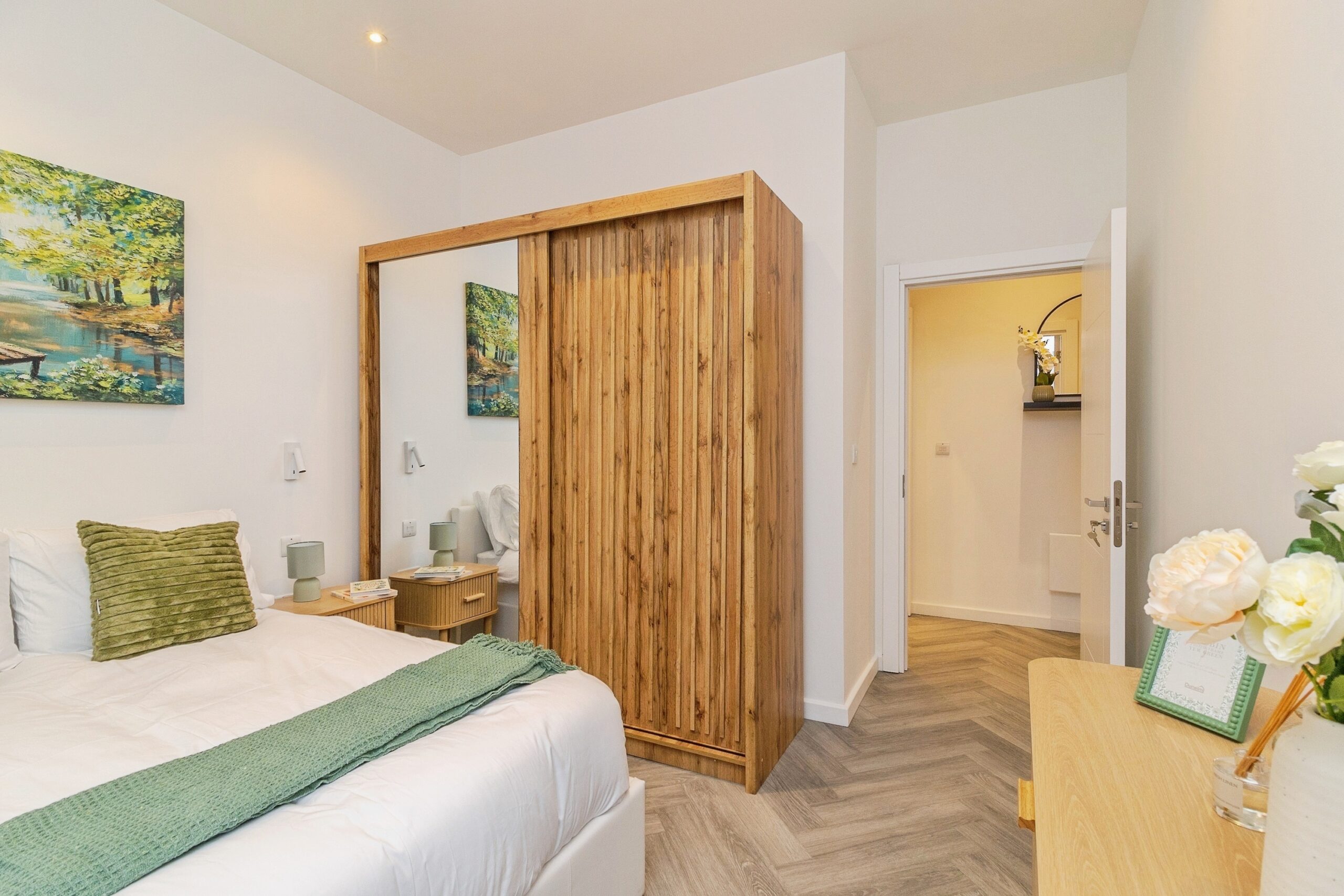 Luxury bedroom at Caldecotte Lake apartments in Milton Keynes with contemporary design, spacious layout, natural light, and premium finishes.